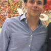 Smiling young man in blue shirt