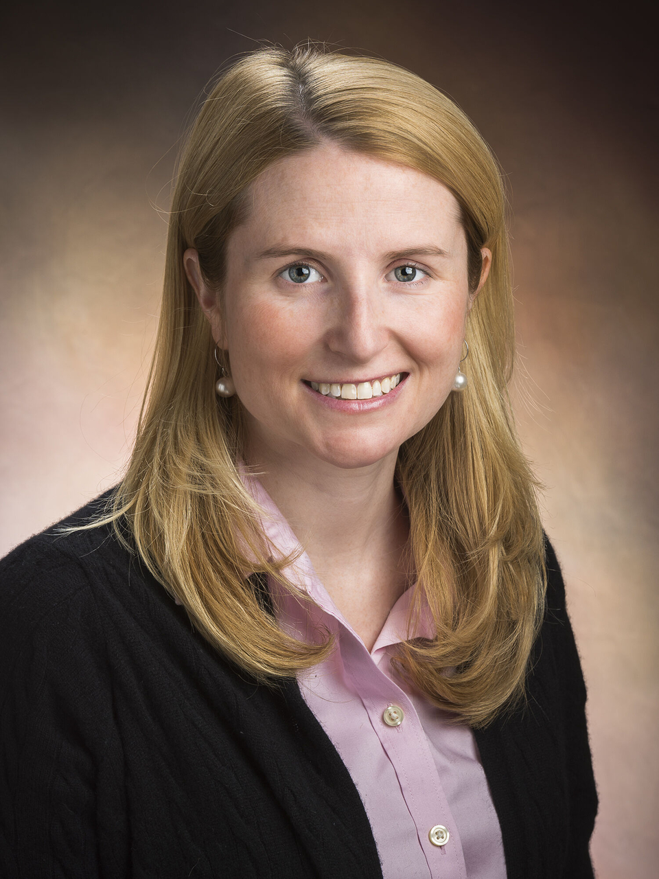Smiling blonde woman professional headshot